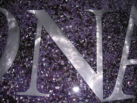 close up photo of grand canyon university logo done in terrazzo